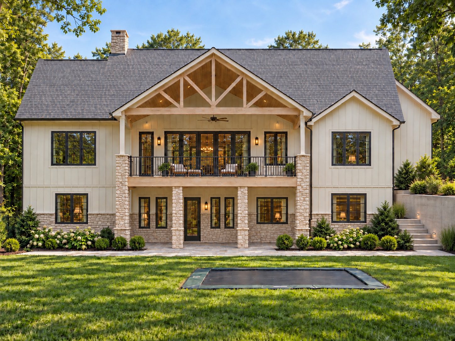 Rear elevation with a stone walkout level and timber framed upper porch